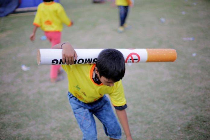 Indian students and activists take part in an anti-tobacco campaign rally